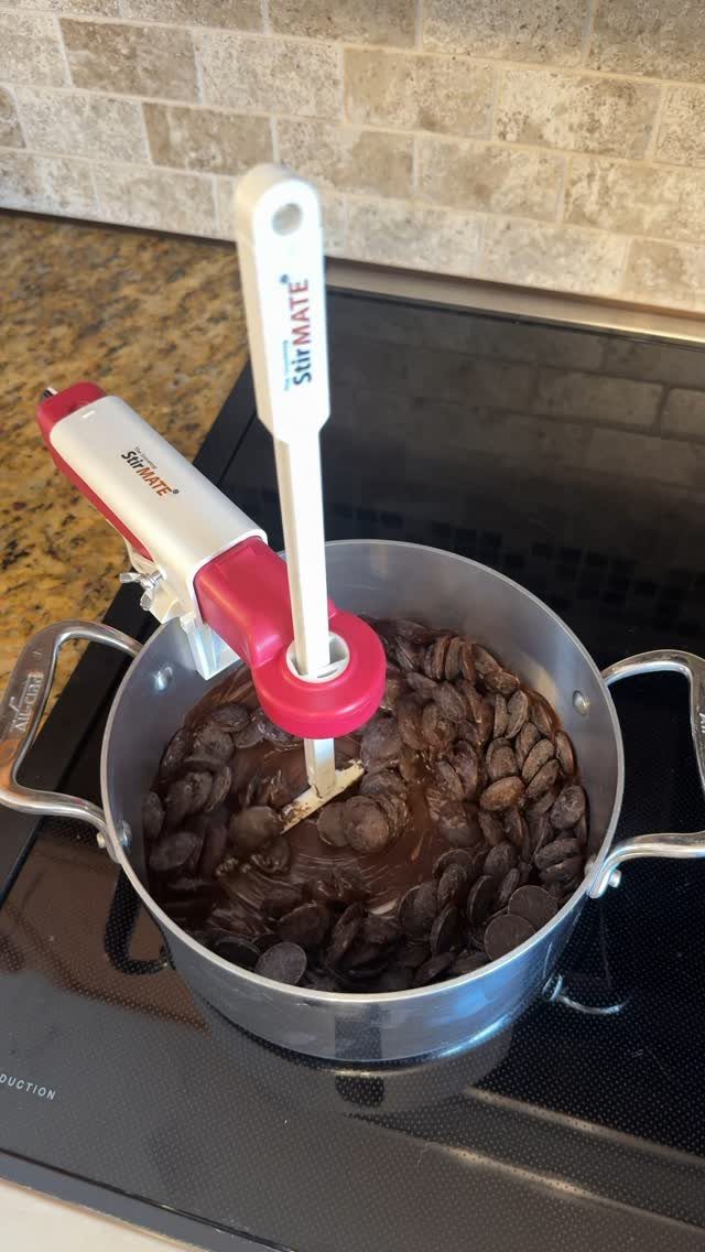 Amazon Kitchen Favorites: 33 Ideas for Cookware and Storage 32 Automatic StirMate stirrer mixing melting chocolate chips in a stainless steel pot.