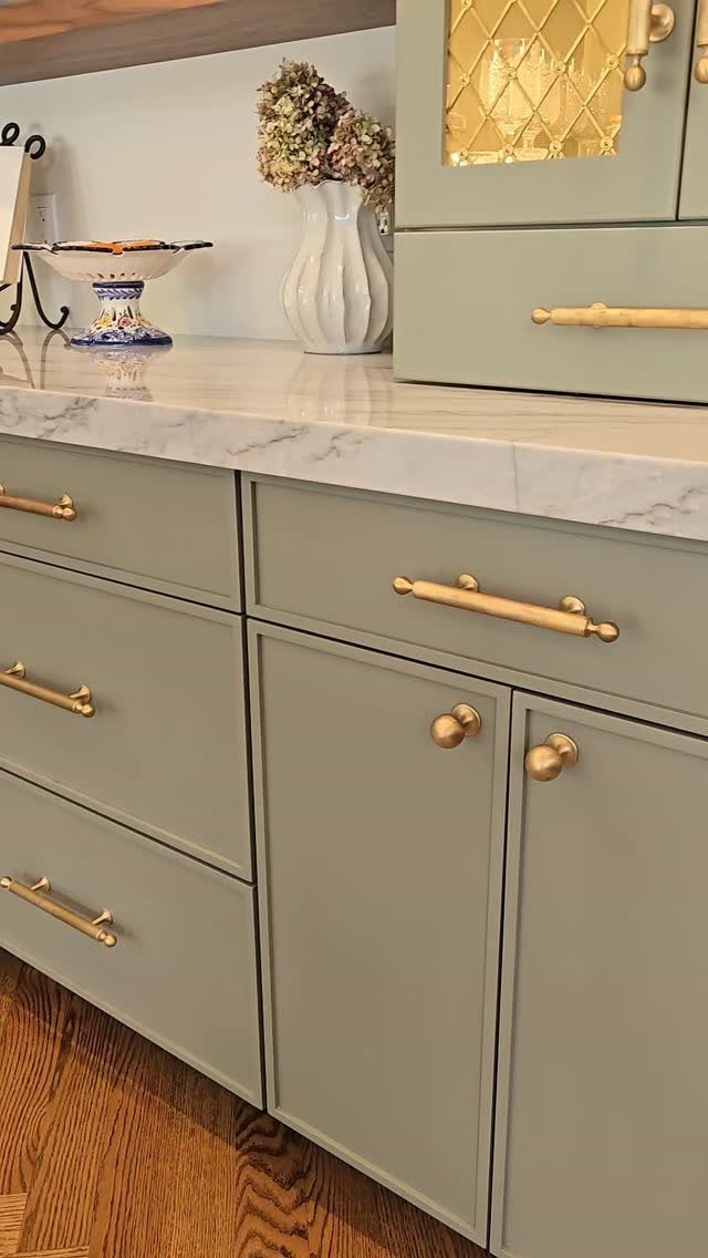 24 Small Kitchen Ideas 2026 for Storage, Style and Layout 15 Sage green kitchen cabinets with elegant brass hardware and white marble countertops.