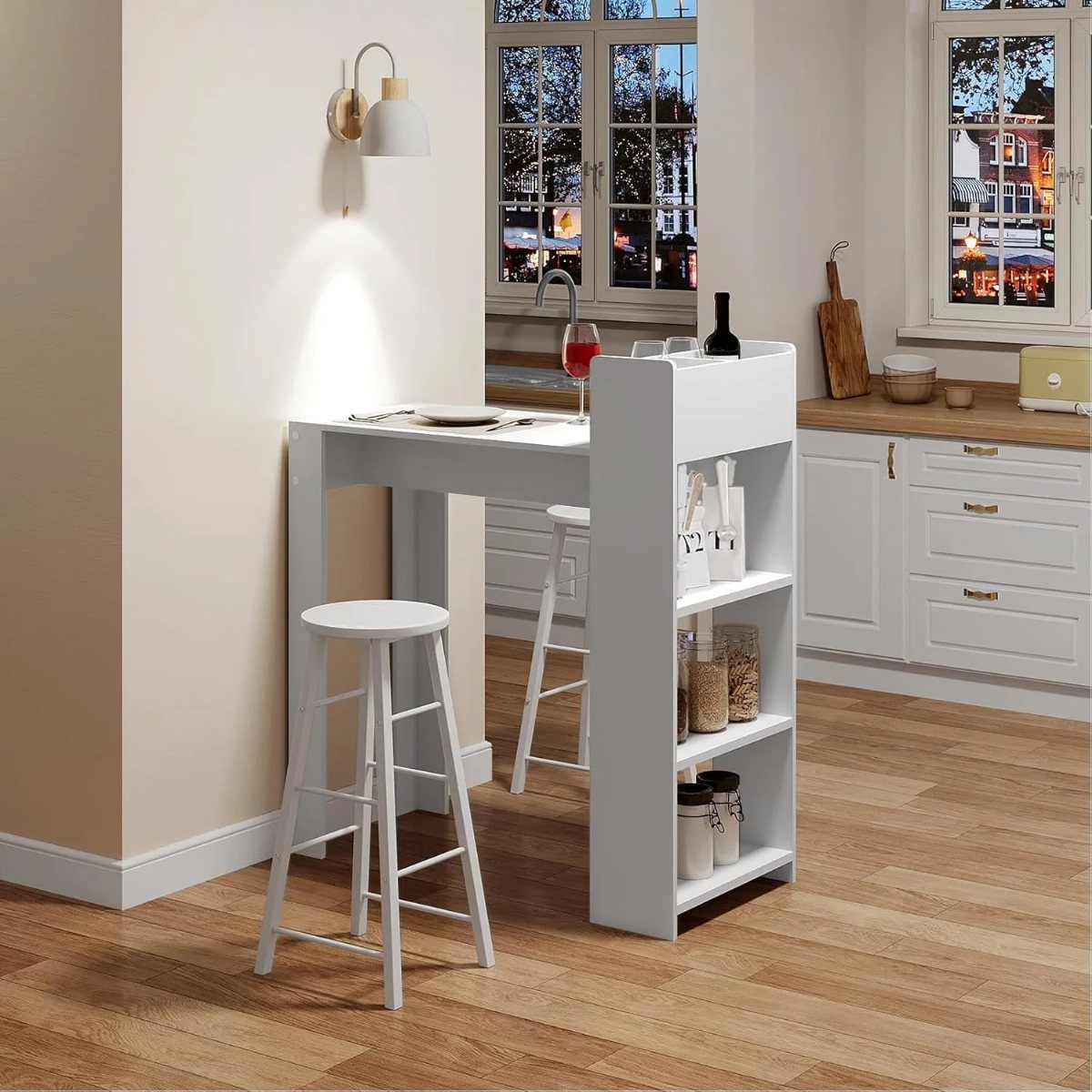 White breakfast table with integrated storage shelves and two matching white bar stools.