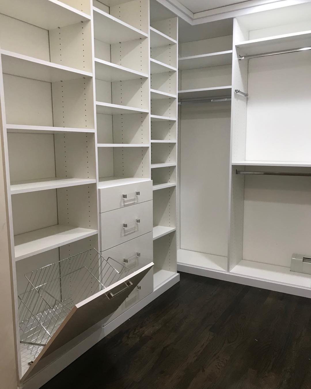Bedroom Walk in Closet Layout: 17 Ideas to Try 7 White walk-in closet with a pull-out wire laundry hamper extended from the base.