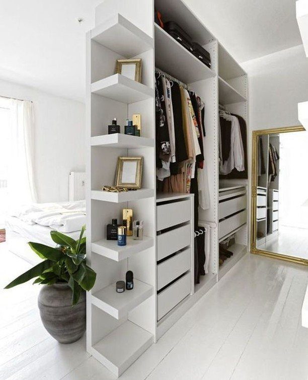 Bedroom Walk in Closet Layout: 17 Ideas to Try 17 White open walk-in closet layout with shelving and drawers in a bright bedroom.