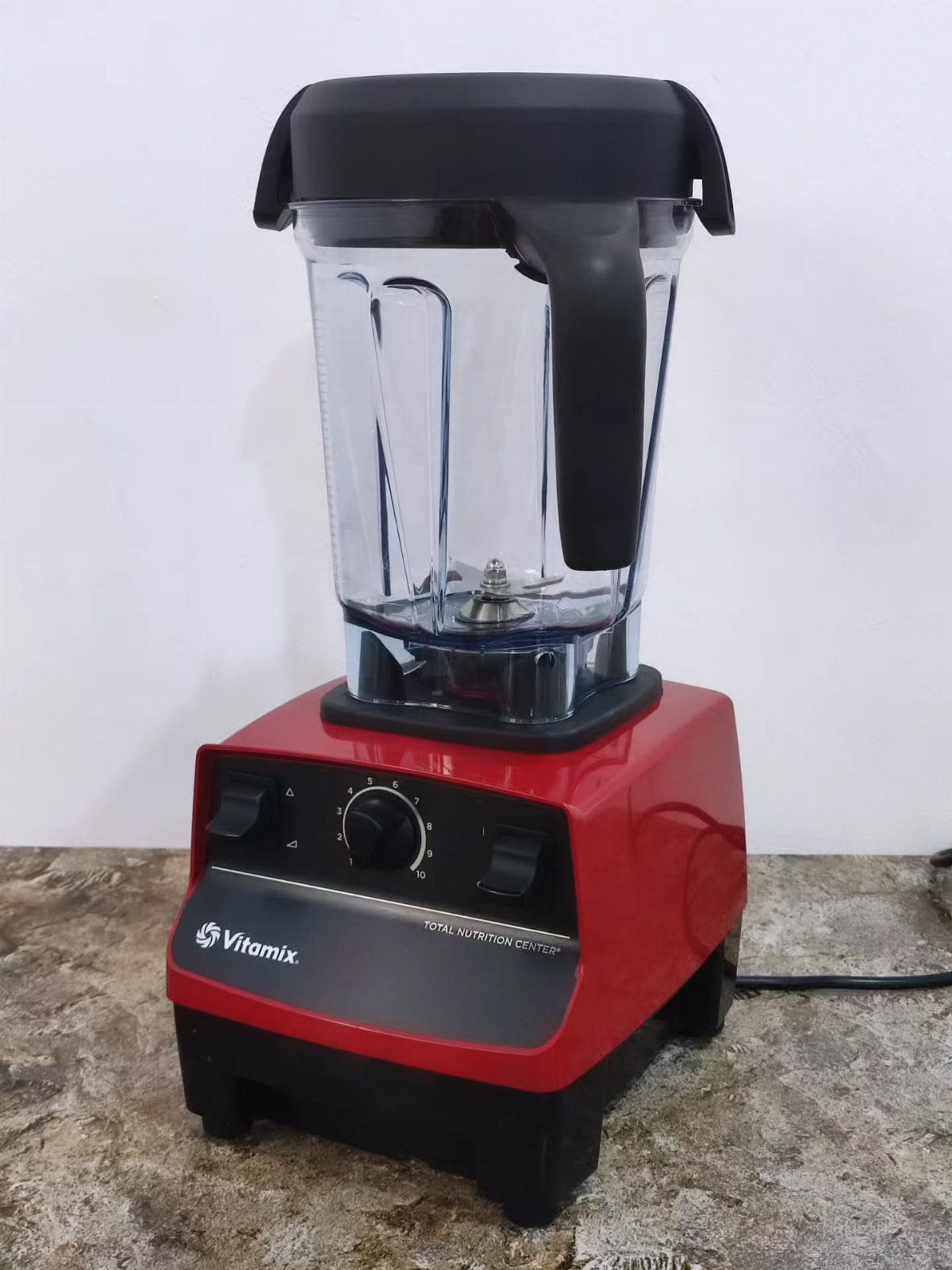 Amazon Kitchen Favorites: 33 Ideas for Cookware and Storage 34 Red Vitamix blender with clear pitcher on a granite kitchen countertop.